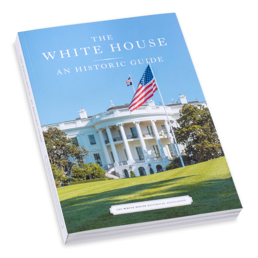 Book titled 'The White House: An Historic Guide' with a photo of the White House on the cover.