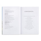 Open book showing a table of contents on a white background
